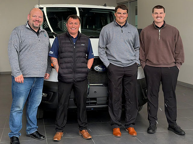 Group Photo in front of the new SAGE on the Go van.