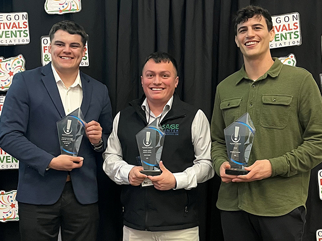 Emilio Jaimez, Angel Aguilar, and Benjamin Harvey (AWS) receive statewide regonition at the Oregon Festivals and Events Association conference.